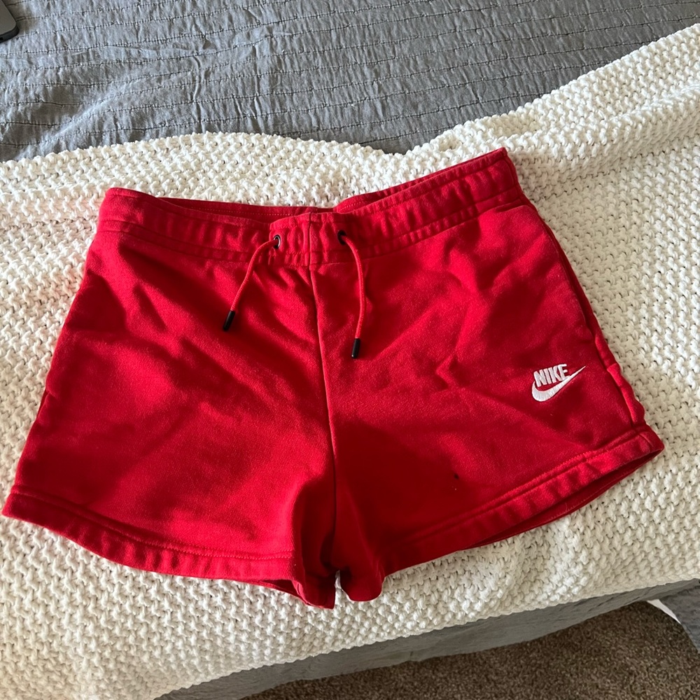 Red Nike shorts